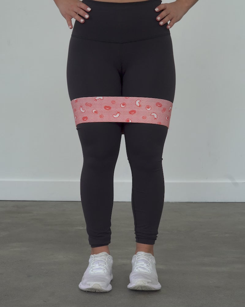 Video demonstration of a standing hip abduction exercise using a heavy resistance MOMO glute band with Ramen design