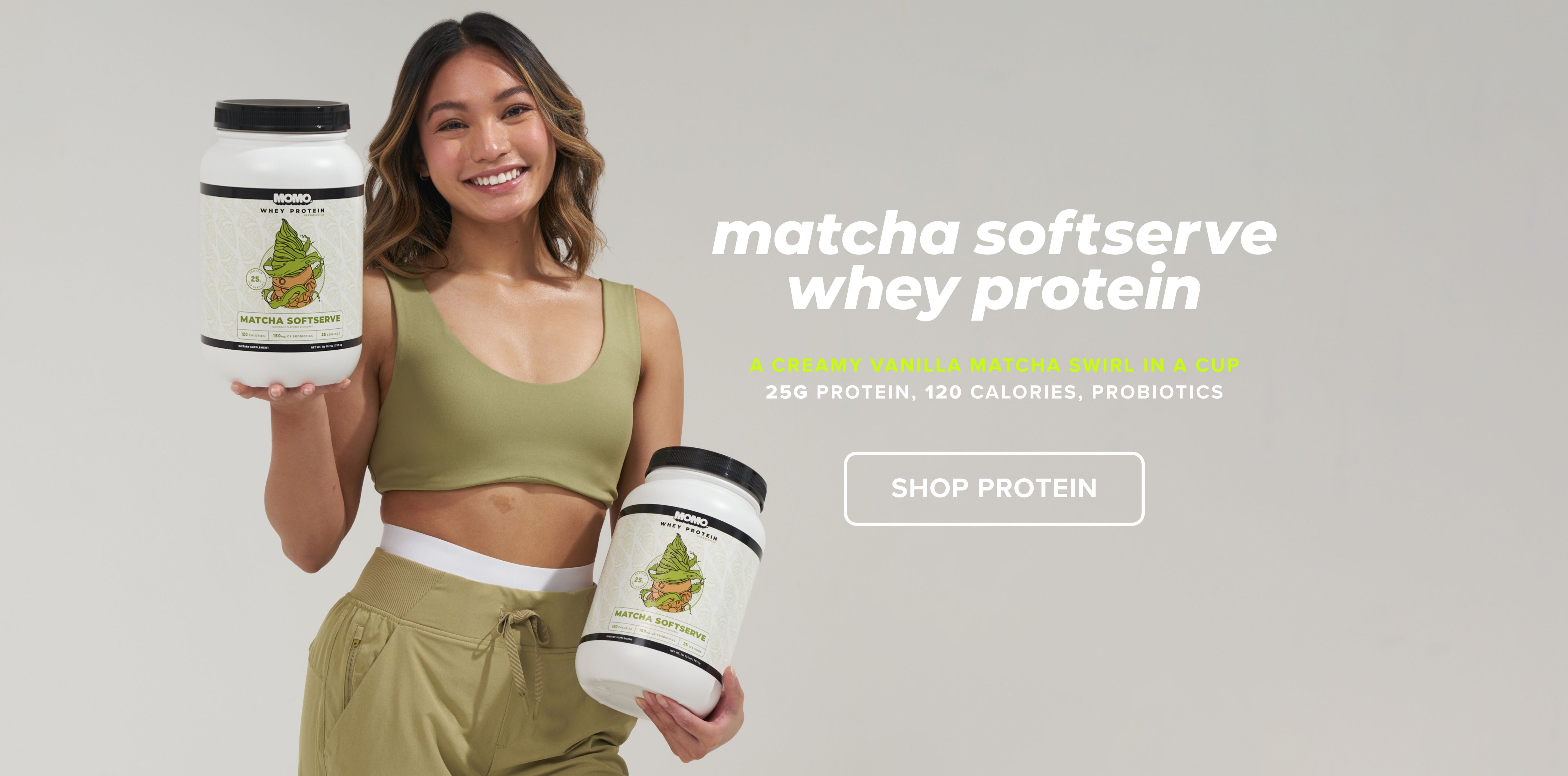 Asian girl holding MOMO Matcha Soft Serve Whey Protein