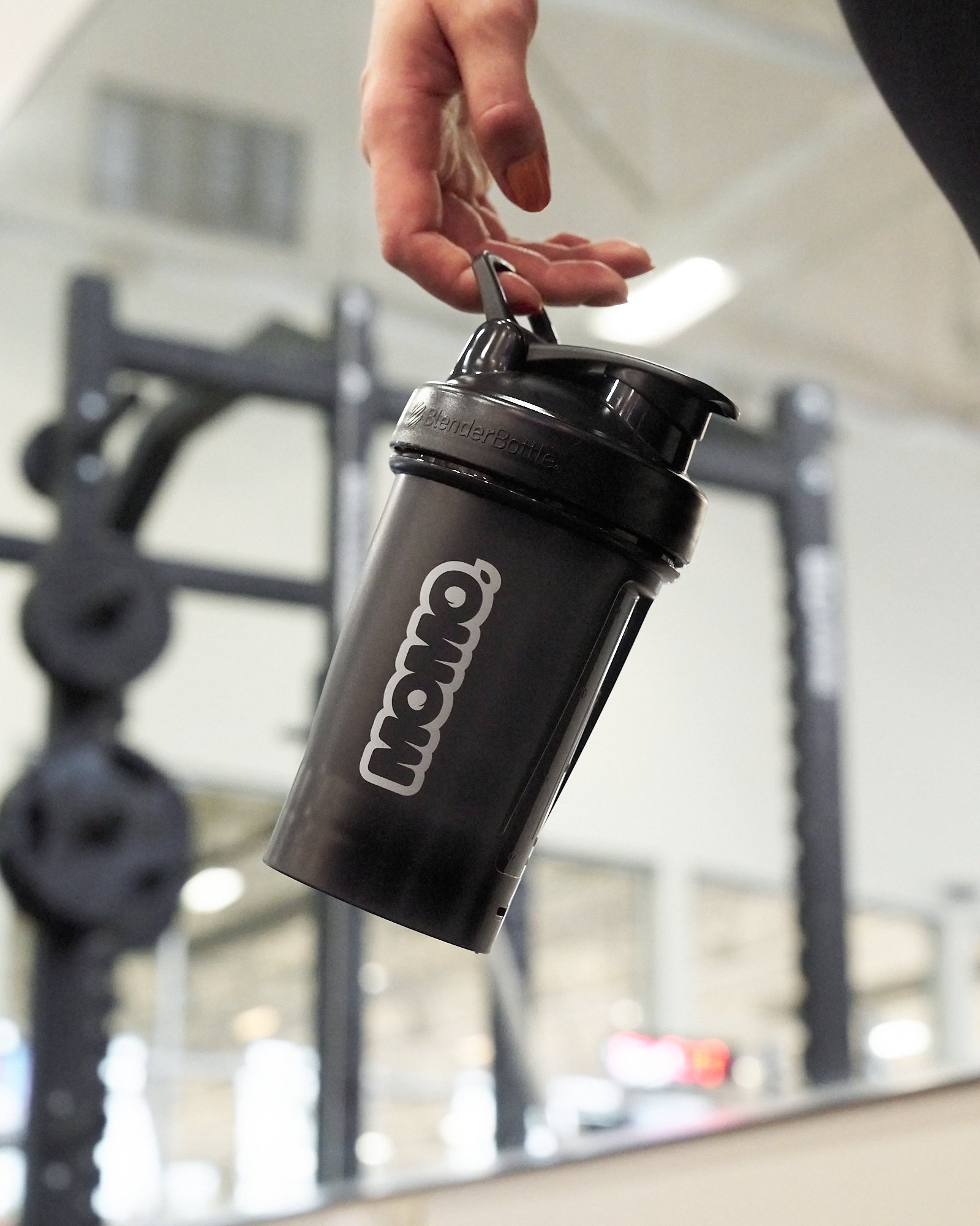 MOMO 20oz White BlenderBottle with wire whisk, in the gym